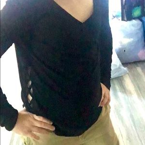 A set of black leggings and a shirt